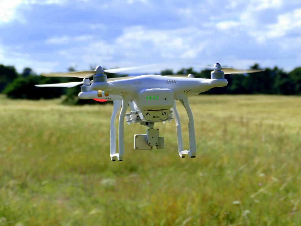 flying drone on field